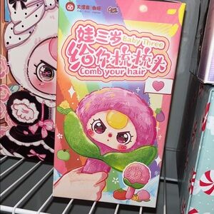 Baby Three Comb Your Hair (Revealed Raddish) foil is sealed
